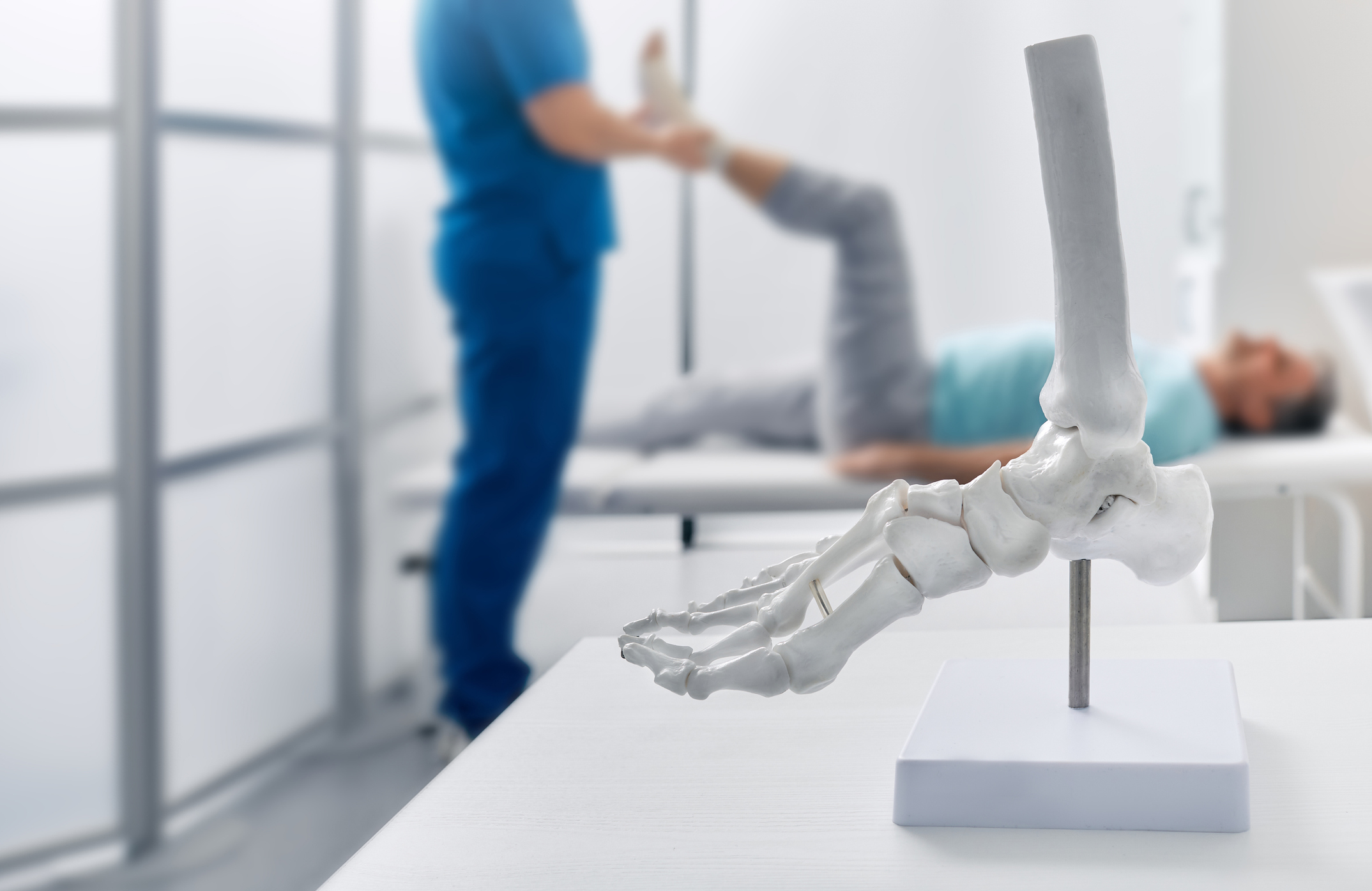 Image showing therapist helping to treat Achilles / Ankle pain